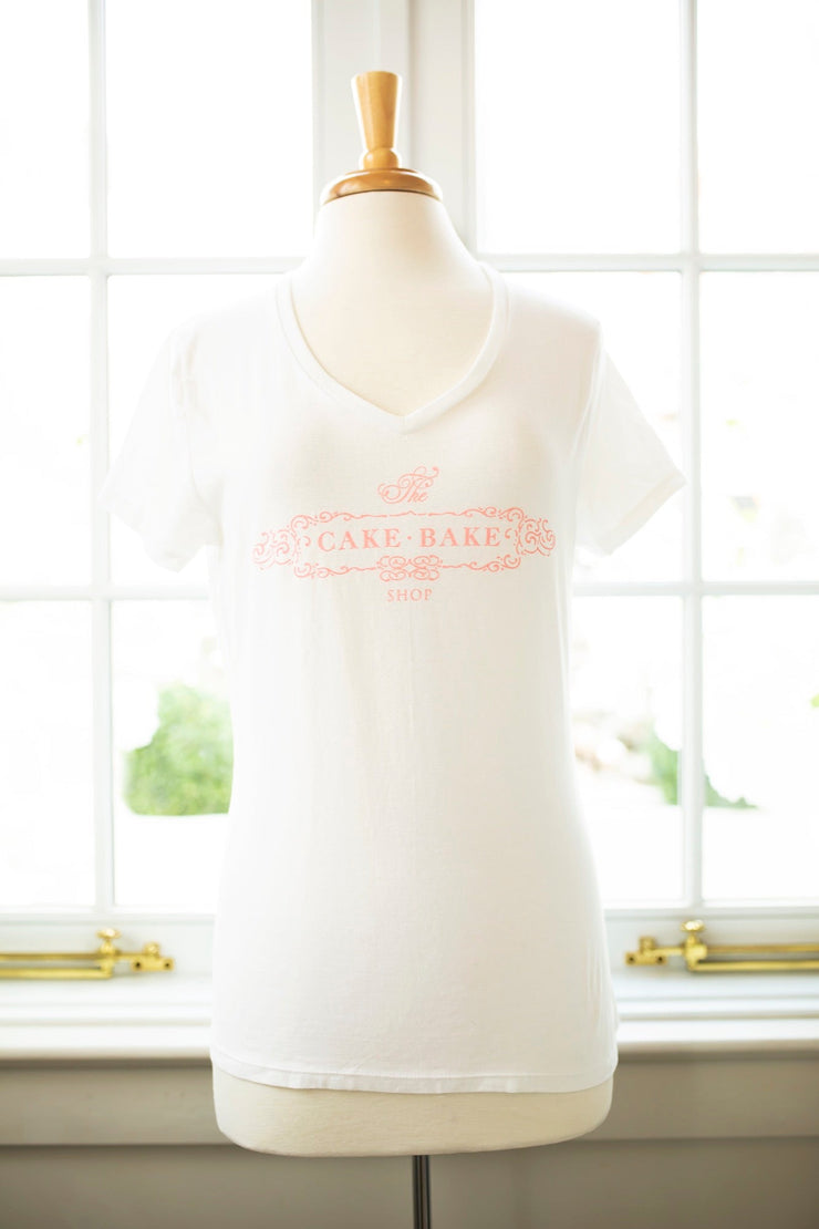 White V-neck T-shirt with Pink Cake Bake Shop Logo (XS - XXL)