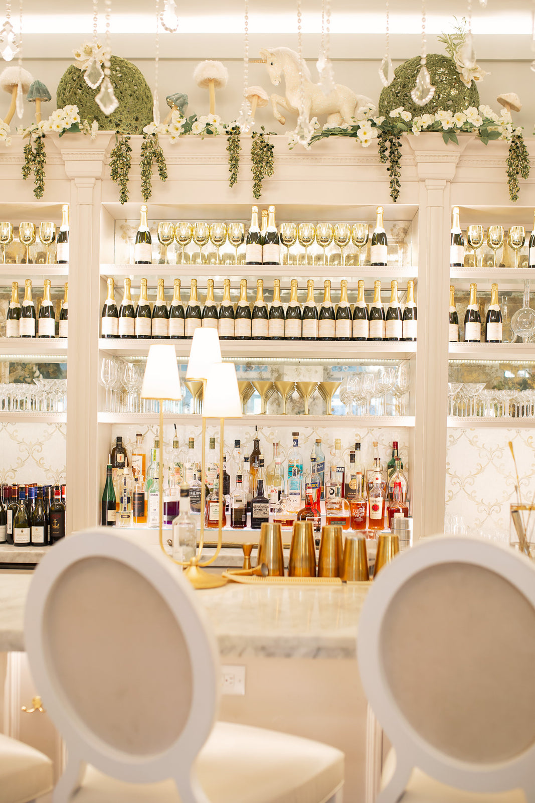 Carmel City Center — chandelier and bar