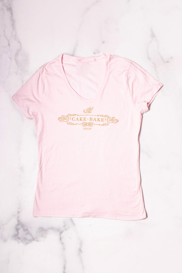 Pink V-neck T-shirt with Gold Cake Bake Shop Logo (XS - XXL)